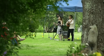 Summer concert, man and woman singing