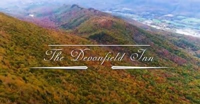 Fall trees with Devonfield text ontop of photo