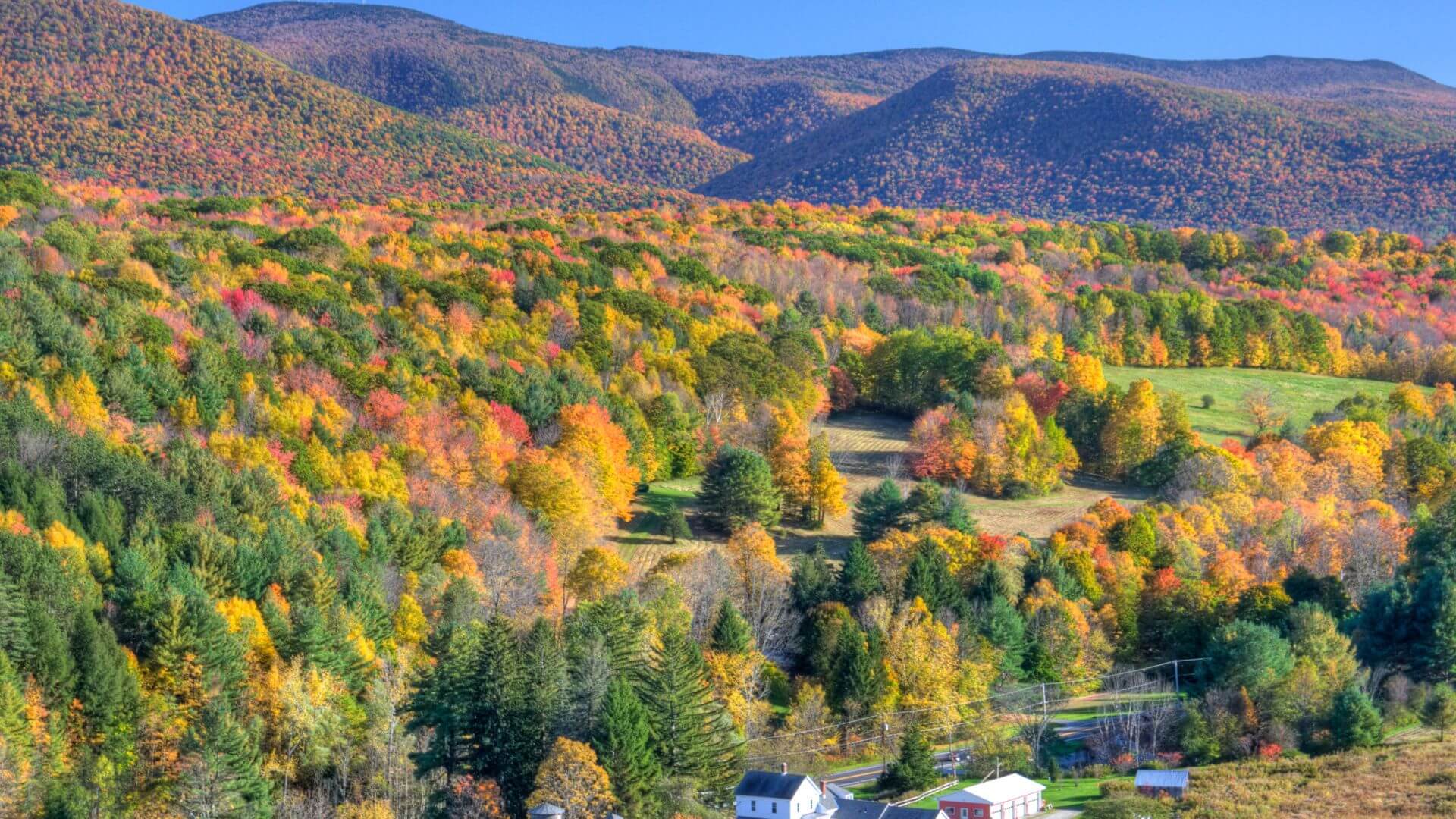 The Berkshires hills bursting with fall foliage in autumn