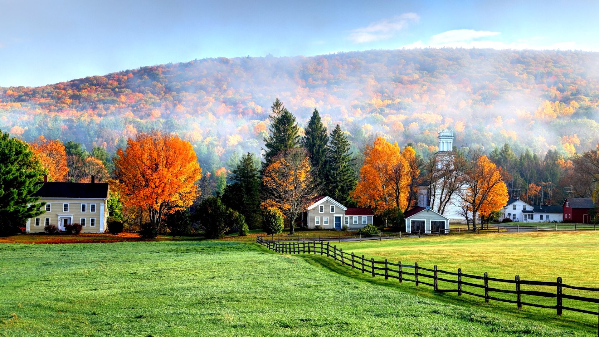 autumn mist over the village of tyringham in the berkshires ma