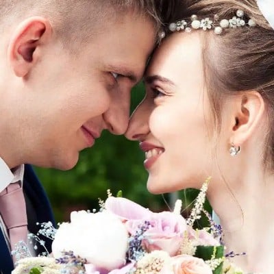 Bride and groom nose to nose