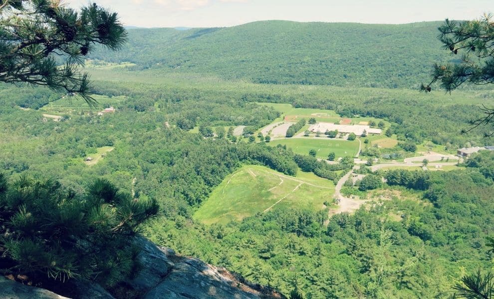 Overview of Stockbridge MA with rolling green hills and trees