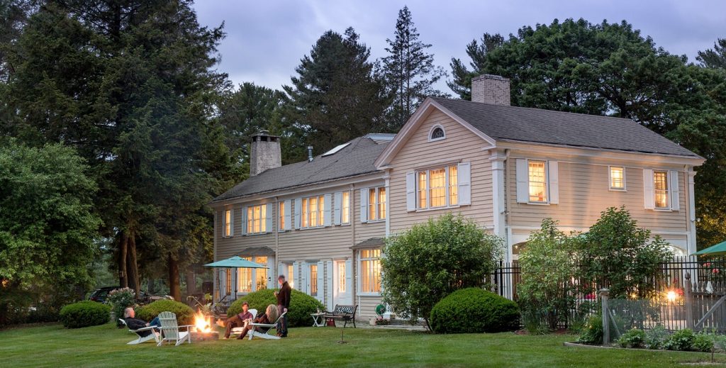 Gathering around the fire pit to enjoy the outdoors in the Berkshires