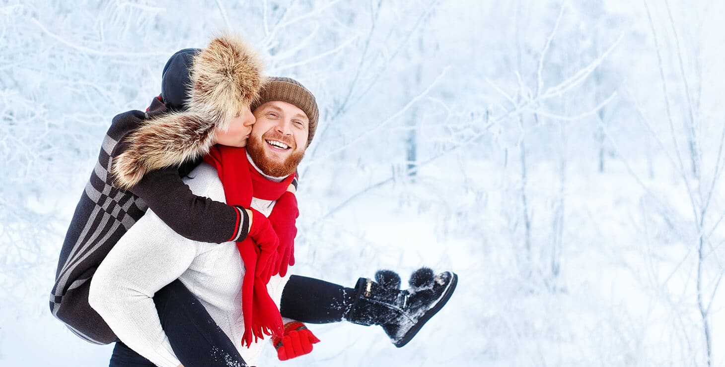 Couple having fun in the snow